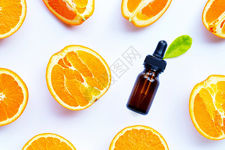 橙色基本油 白底带新鲜水果按摩药品滴管治疗玻璃香水温泉香气身体卫生图片