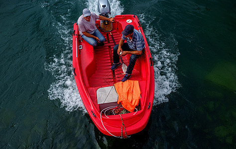 日内瓦地貌景观汽艇假期闲暇乐趣速度快艇航行运动帽子蓝色图片