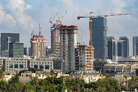 这座城市的一栋高楼建筑学公寓电话全景商业脚手架城市生长工程活力图片