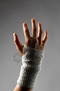 用愈合绷带包裹的手腕损伤情况事故手指成人治疗保健援助理疗师伤害图片