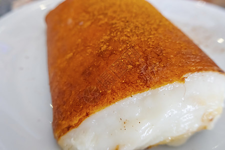 准备吃传统的土耳其甜点卡桑迪比灯丝面包烹饪粉末糖浆美食食物糕点文化肉桂图片