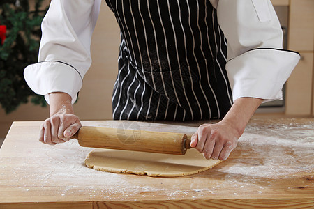 擀面餐厅面团桌子糕点烹饪食物面包面粉面包师厨师图片