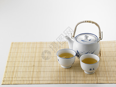 茶茶壶草本绿色杯子陶器茶碗文化白色棕色健康制品图片