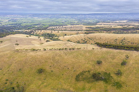 澳大利亚区域地区滚动绿山的空中景象绿色森林丘陵环境灌木丛风景林地公园衬套棕色图片