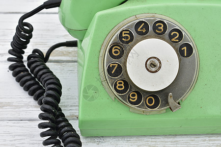 绿色的旧旧回转拨电话图片