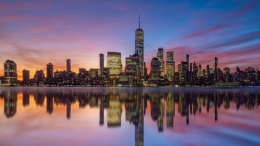 日落时的纽约市中心天际线  美丽的城市景观摩天大楼建筑学天空全景办公室建筑市中心地标日出旅行图片