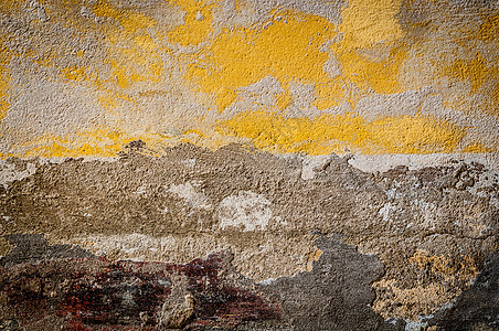 旧墙壁背景裂缝白色空白石头风化黄色材料建筑学水泥建筑图片