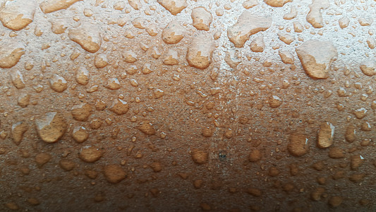 木地板上的水滴反射雨季地面雨滴白色棕色瓷砖木头飞沫粉色图片