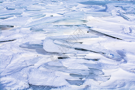 俄罗斯Baikal湖冰冻湖中的冰雪立方体天气冻结场景风景冰块水晶天空蓝色旅行宏观图片