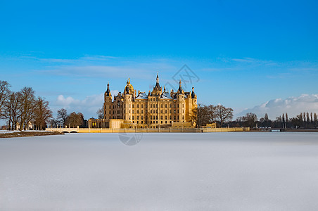 雪城堡美丽的童话时代的施韦林城堡 在冬天摄影建筑全景文化历史性历史地标地方建筑学公园背景