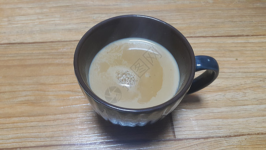 红茶牛奶品尝浓咖啡高清图片