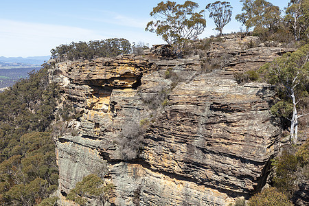 澳大利亚地区中部高原的墙棕色天空林地土地衬套森林绿色沟壑蓝色旅行图片