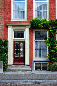 荷兰旧房子的门和窗子建筑学房屋街道细节建筑入口窗户图片