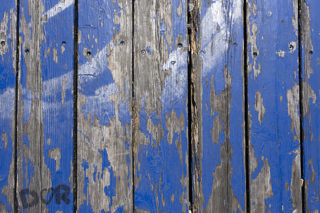 旧木漆的蓝色生锈背景 油漆剥皮图片