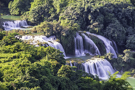 Ban Gioc  越南高邦的德台瀑布溪流森林绿色热带库存水池丛林旅行瀑布风景图片