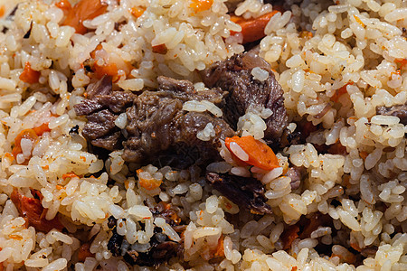 传统东部烹饪菜皮拉夫 成分 大米和肉片蔬菜食物厨房猪肉油炸香料国家羊肉牛肉美食图片