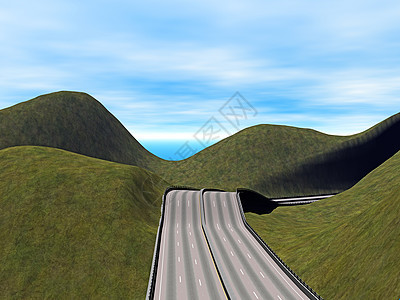 穿过山丘地貌的宽阔道路山脉荒地绿色柏油天空草地丘陵图片