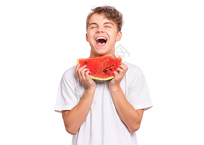 黄瓜白西瓜的少年男孩食物快乐微笑水果青少年营养乐趣饮食男生情感图片
