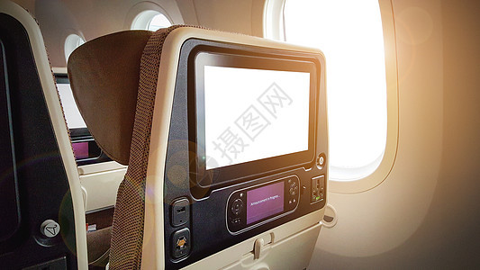 飞机后方的LCD座椅电影耀斑假期座位展示旅行旅游白色乘客技术图片