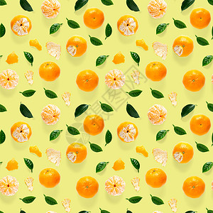 普通话无缝图案 橘子和克蕾婷 用绿色叶子隔离在黄色背景上 收集完好的无缝图案柑桔模式收藏设计食物异国墙纸情调作品水果图片