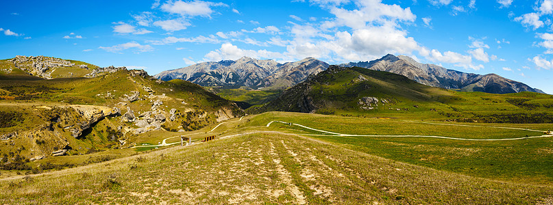 新西兰的山丘高地城堡地区高山草原草地路线曲线山脉旅行全景国家滚动图片