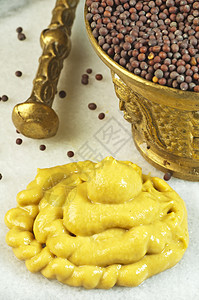 芥末种子和芥子酱美食调味品雌蕊芳香蔬菜享受产品黄色棕色食物图片