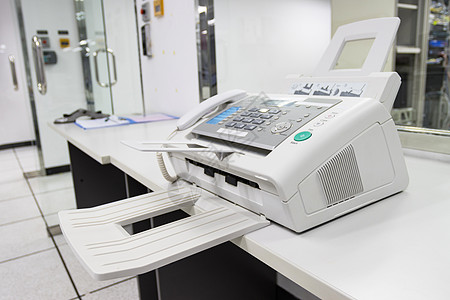 传真机用于将文件发送到办公室的传真机 概念电话多功能工作机器扫描复印件激光白色扫描器复印机图片