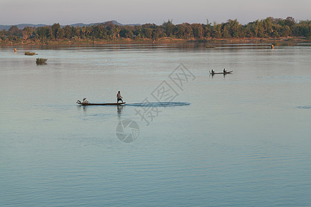 1 12 2012年12月12日日落时湄公河 与渔船和渔网太阳钓鱼小时蓝色传统背景图片