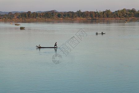 1 12 2012年12月12日日落时湄公河 与渔船和渔网小时蓝色太阳钓鱼传统背景图片