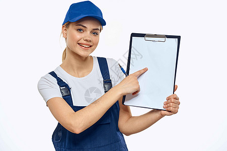 统一文件递送服务信使服务中的工作妇女职业妇女商业成人工作室纸盒工人盒子微笑导游蓝色女士图片