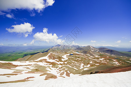 山区地貌蓝天树木火山丘陵植物旅游娱乐蓝色灌木丛火山口图片