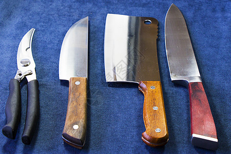 收集蓝背景的厨房刀收藏厨师木头烹饪刀块厨具金属餐厅食物刀刃钢刀图片
