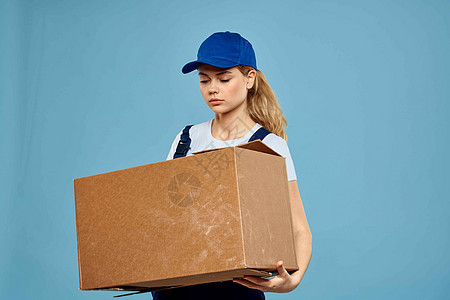 手袋包装服务交付服务的妇女工作表格箱 蓝色背景送货纸板导游微笑成人纸盒运输盒子工人工作室图片