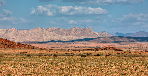 非洲野外纳米比亚勃兰伯格山岩石阳光石头地质学编队山脉花岗岩日落风景旅行图片