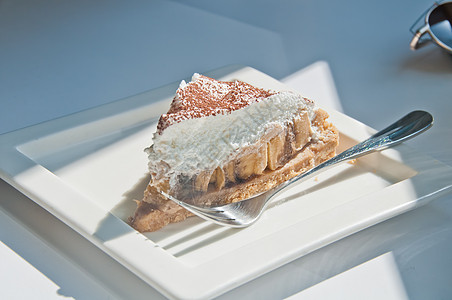 纽约芝士蛋糕 白方花环面的美味美食白色营养蛋糕甜点盘子小吃勺子食物图片