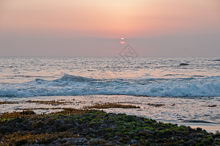 巴厘Tanah Lot海滩晚夕日落场景图片