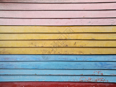 粉红色黄色蓝蓝色红木板木板背景墙壁图片