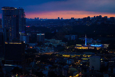 夜晚城市日落 雨云笼罩夜雨 对吉隆坡风景的美景引人瞩目天际景观建筑学办公室旅游场景中心商业建筑首都图片