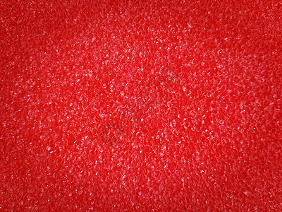 红泡沫塑料海绵纹理背景图片