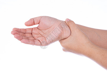 女性握着手腕的手与世隔绝的白种背景 医疗 为广告概念提供保健药品伤害身体手指风湿肌肉神经病脚气疾病扭伤图片