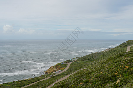 从圣迭戈湾口的洛马半岛角山顶对海洋的观光景象砂岩公园历史天空地标旅行吸引力旅游海浪游客图片