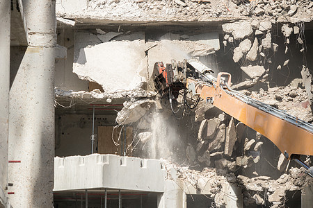 建筑物的拆除工地推土机石头危险废墟机器运输货车灰尘建筑学卡车图片