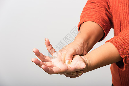 她握着手腕的 女人疾病风湿病骨科隧道身体手指痛苦肌肉女士压力图片
