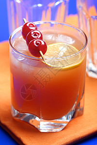 死鱼生命摄影杯子热带叶子玻璃派对水果柠檬橙子液体果汁图片