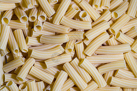 意大利未烹调的托里格里奥尼意大利面条的最顶端视图麸质营养食物生食烹饪面食小麦糖类美食黄色图片