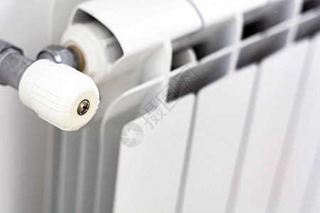 用于调整散热器温度的白色端点的近距离视图  info tooltip阀门暖气片器具活力控制调节器房间家庭生活温暖管道图片