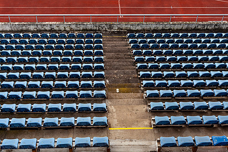 运动体育场的空礼堂 一排蓝椅子跑步蓝色竞技场竞争竞技建筑学白色足球赛马场场地图片