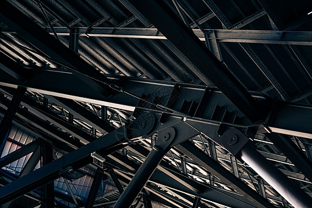 大型建筑的金属载体结构含金属框架场景城市太阳工程蓝色技术建筑学钢结构房子背景