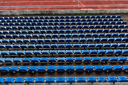 运动体育场被废弃的礼堂竞技建筑学赛马场红色足球蓝色白色场地短跑车道图片