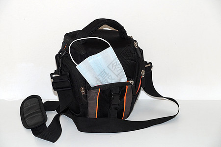 闭合的袋子里装有医疗面具卫生流感相机背心疾病感染药品呼吸预防案件图片